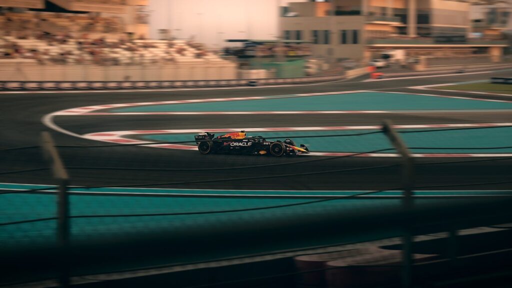 Exciting Formula 1 car racing on the Yas Marina Circuit, Abu Dhabi.