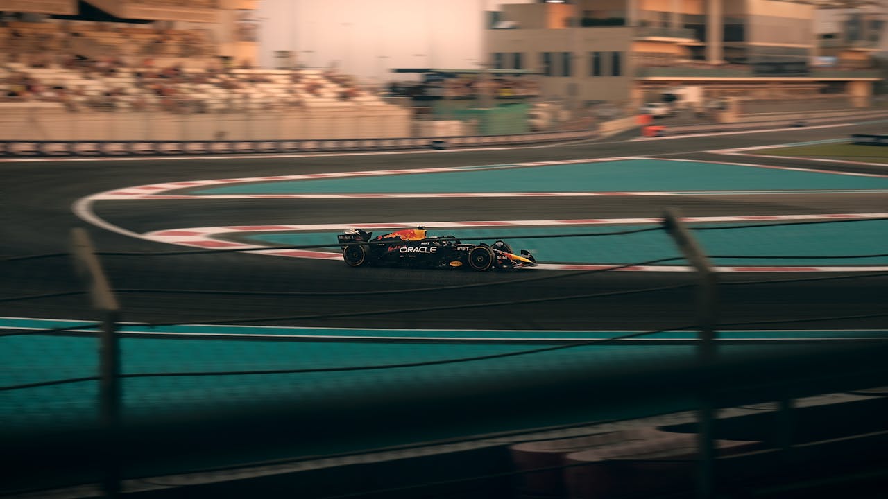 Exciting Formula 1 car racing on the Yas Marina Circuit, Abu Dhabi.