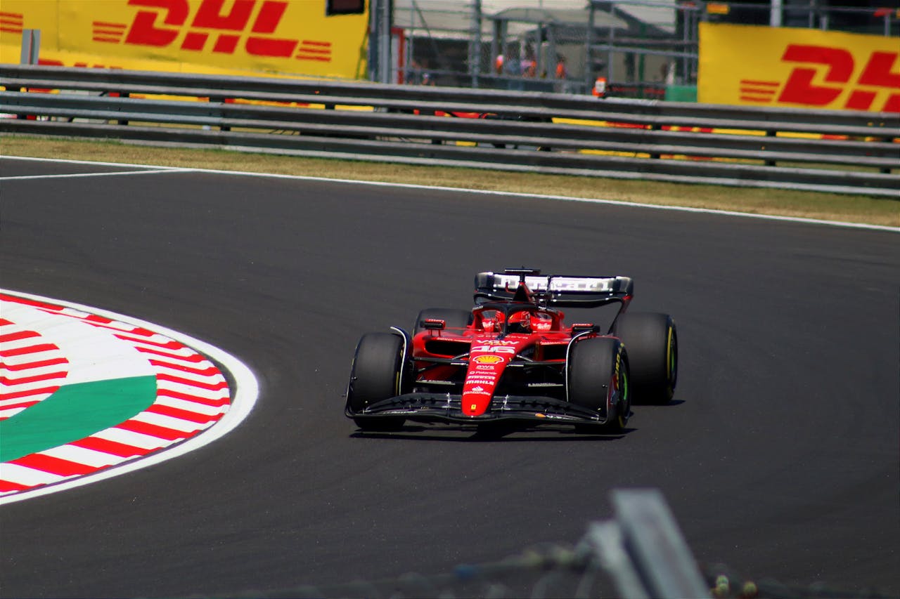 Ferrari F1 car racing at the Hungarian Grand Prix, showcasing thrilling motorsport action.